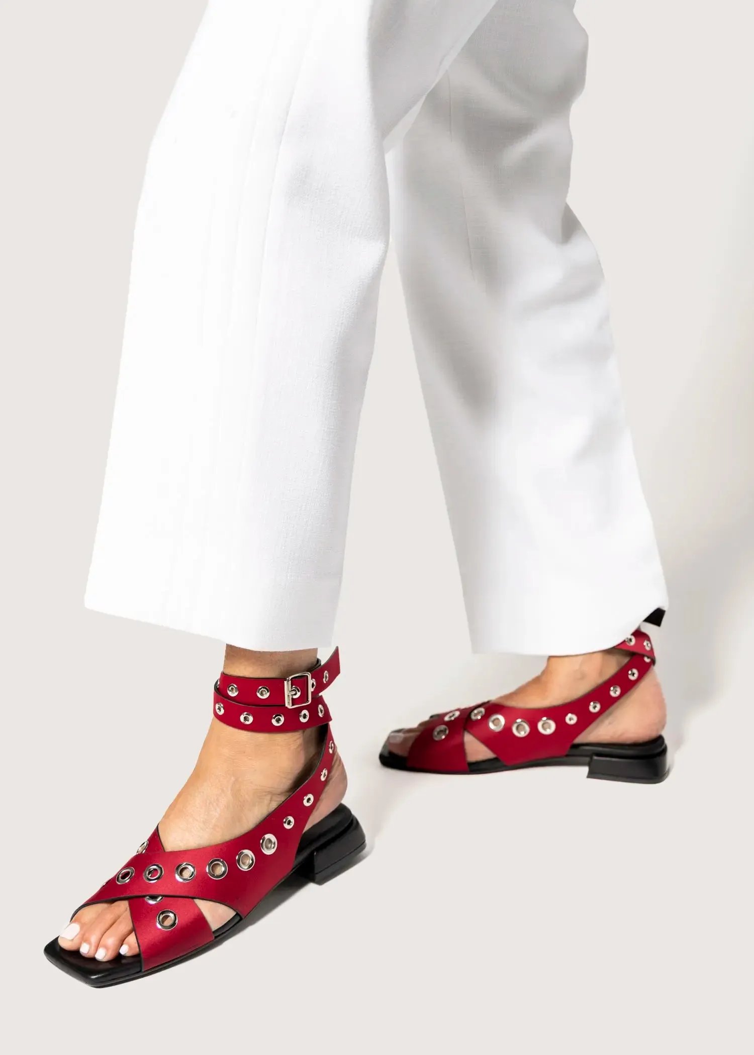 Flat Sandal With Grommets