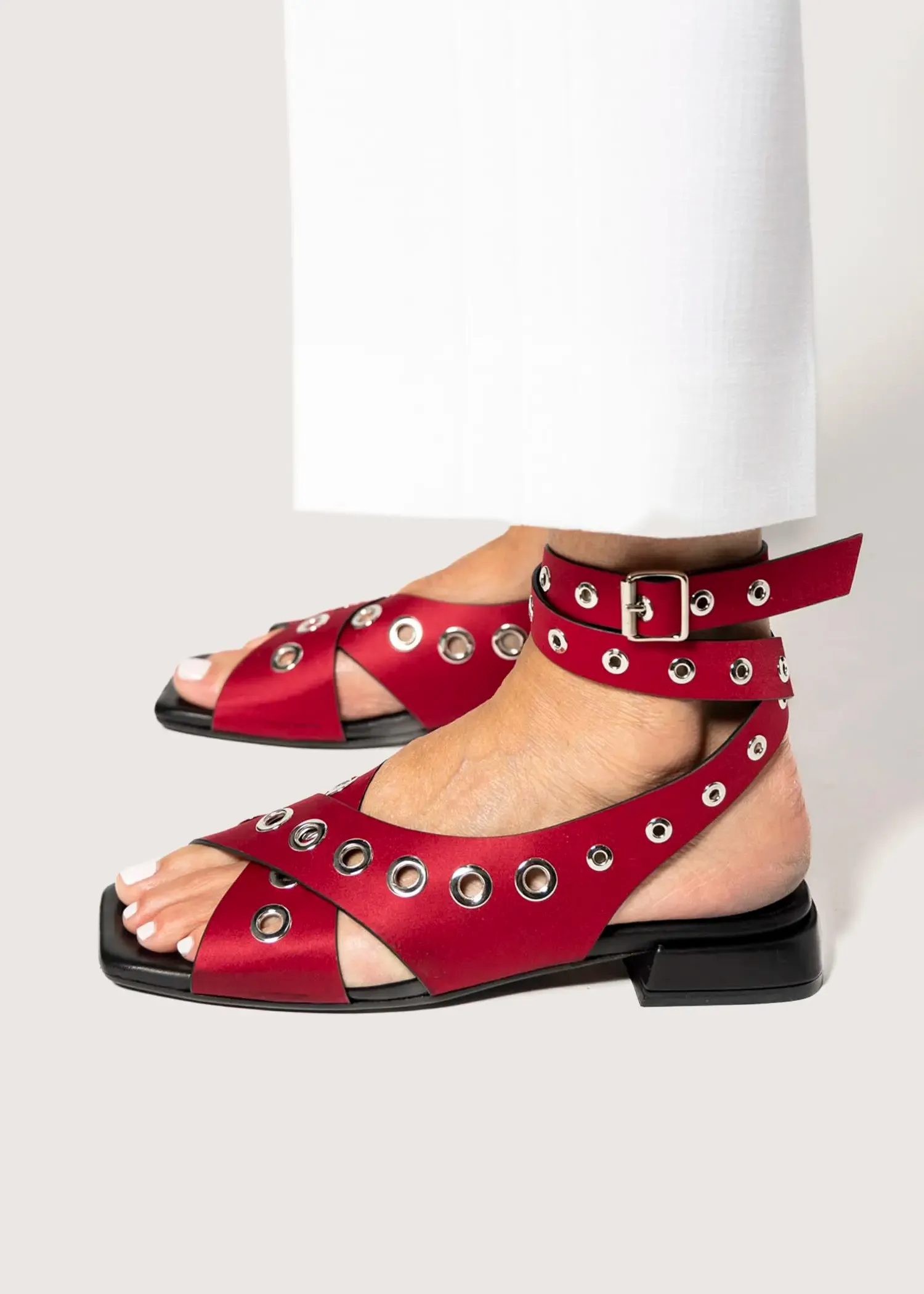 Flat Sandal With Grommets
