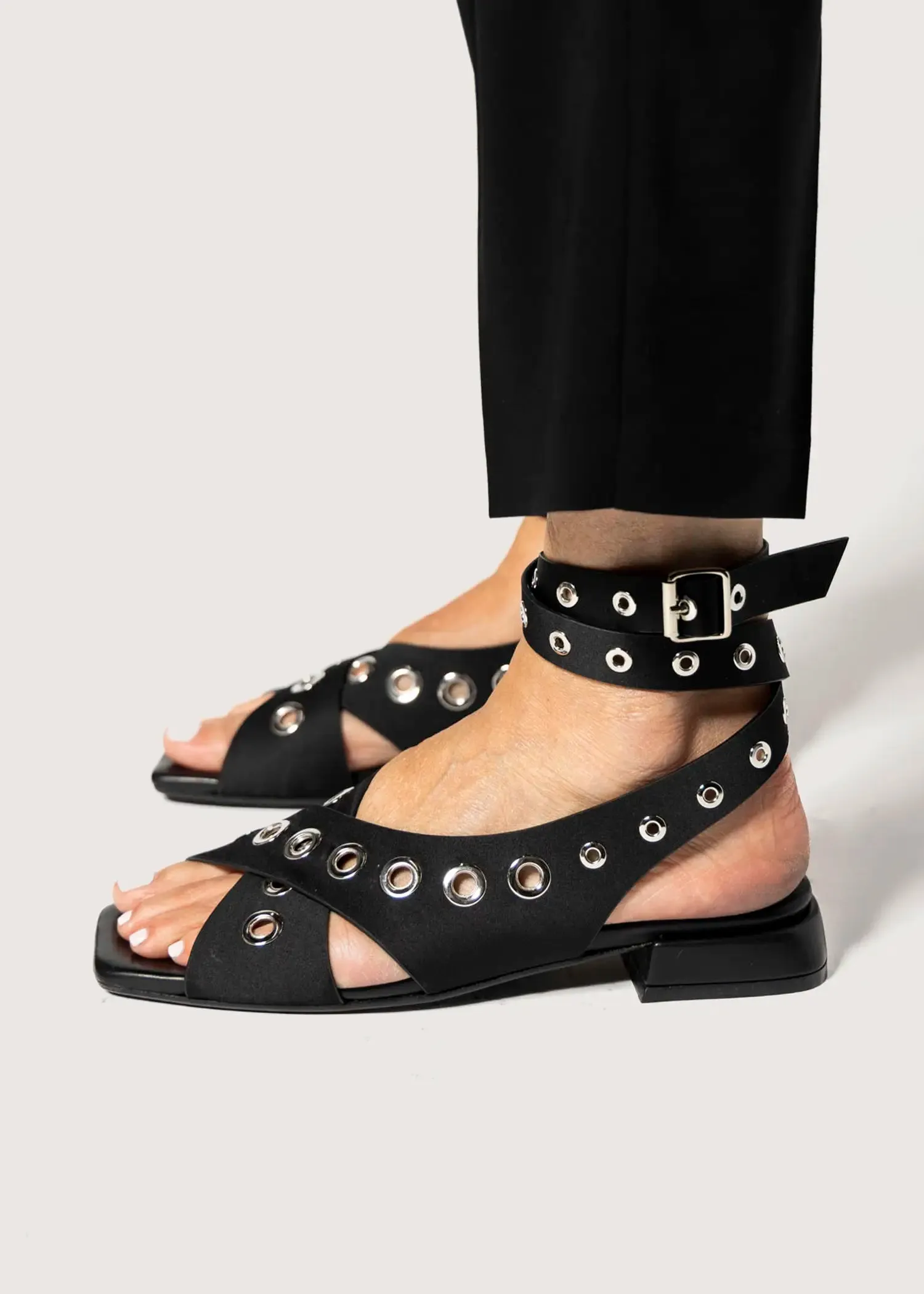 Flat Sandal With Grommets