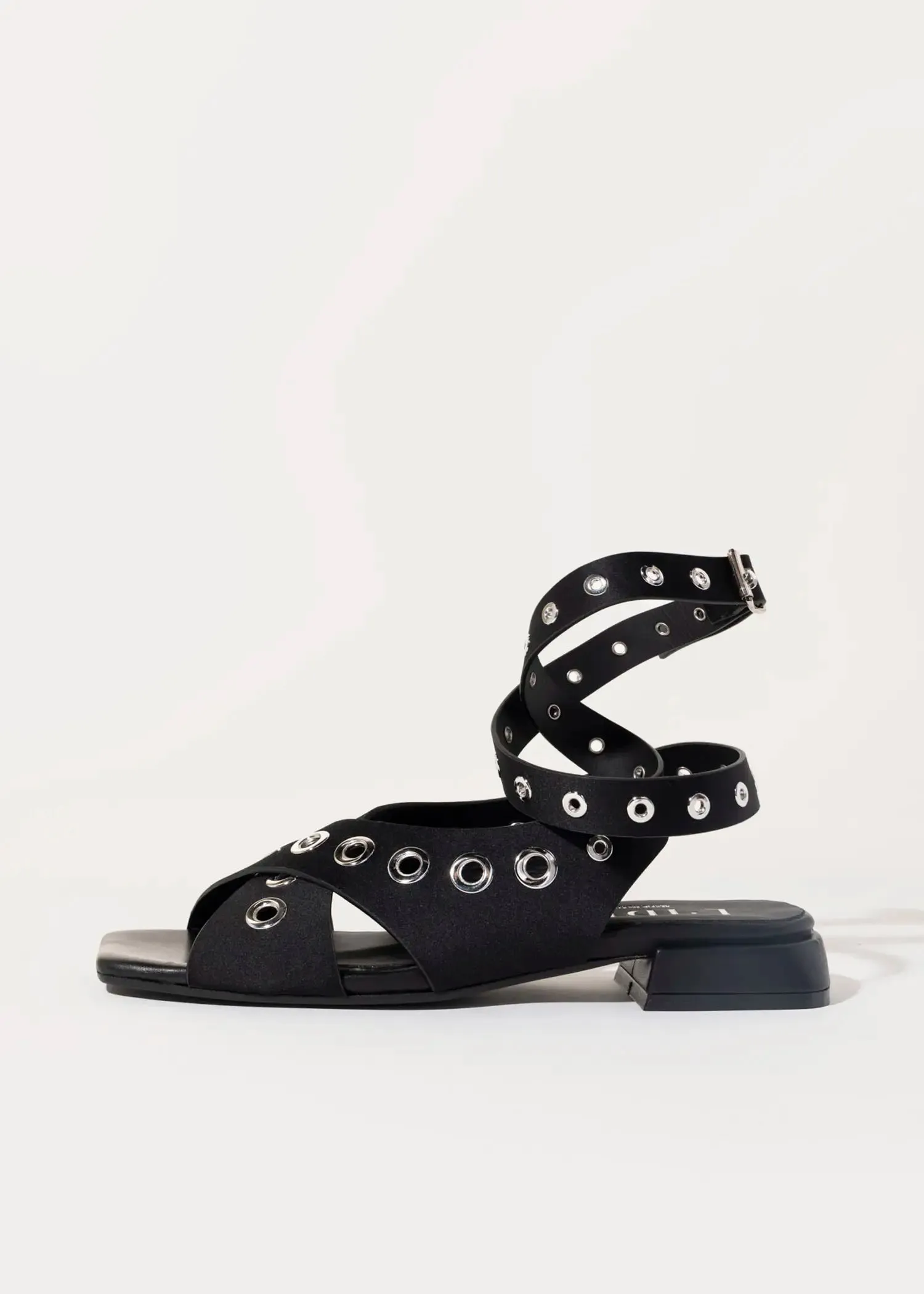 Flat Sandal With Grommets